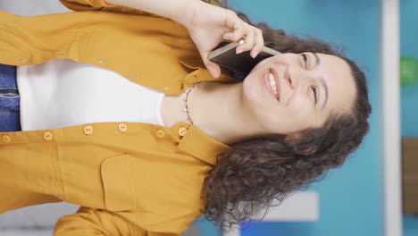 Vertical-video-of-Young-woman-receiving-gospel-on-the-phone.